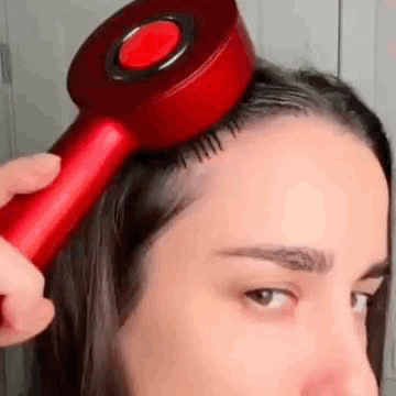 Aura Capilar™ Cepillo masajeador para lucir un cabello mas fuerte y saludable.